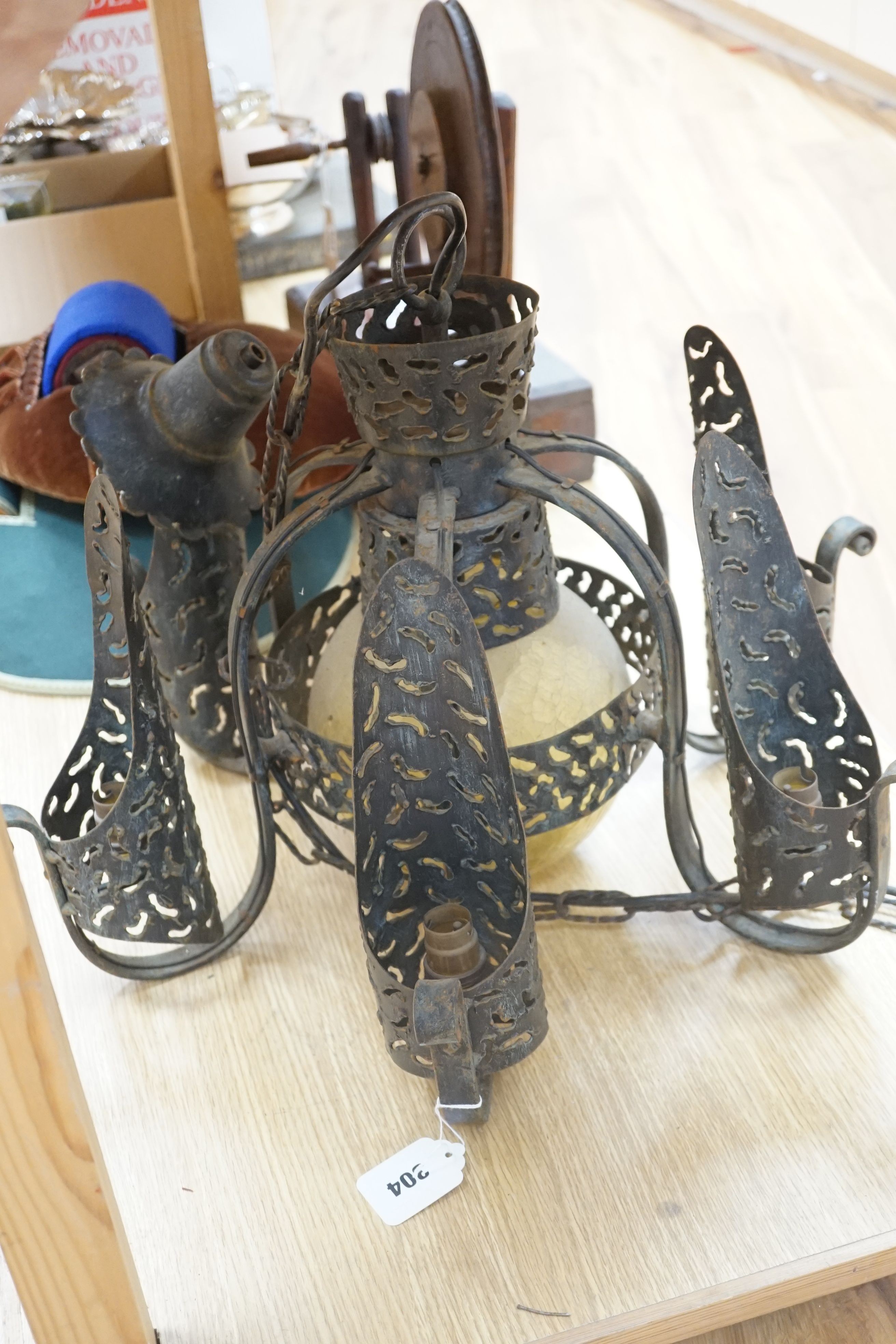 An early 20th century iron chandelier